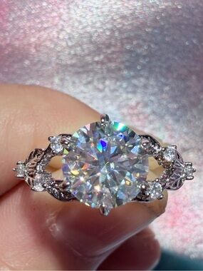 New 2 Carat Moissanite Ring with Intricate Band with Stones for Extra Sparkle